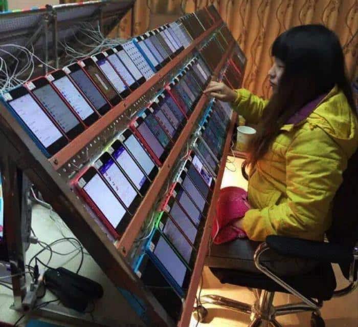 Click Farmer in China , circa 2015. Now automated at a much larger scale and no longer requiring a human to manually click

Asian women manually clicking and liking post with a wall of lots of phones